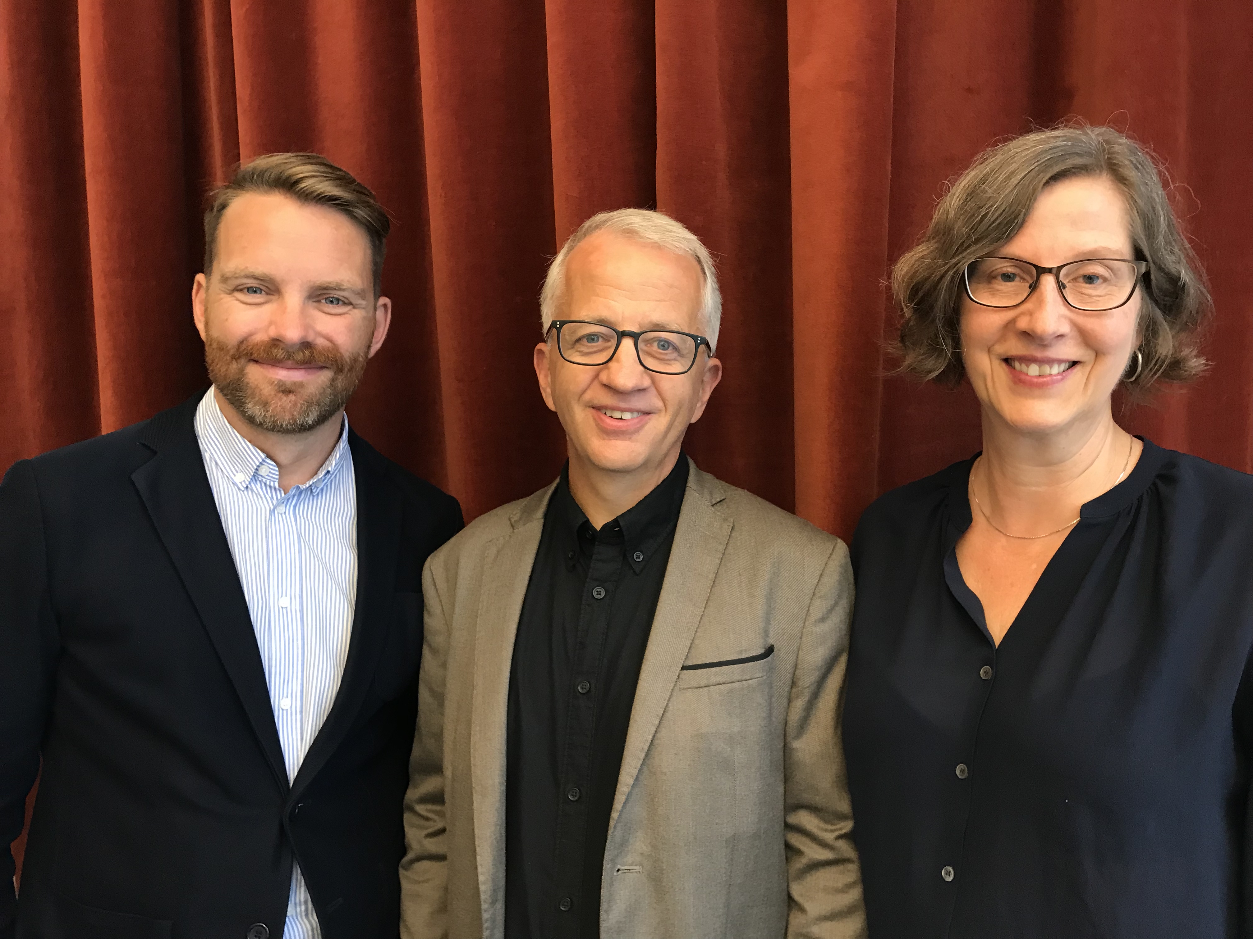 Hans Linde, Mats Hårsmar och Birgitta Weibahr står bredvid varandra och ler mot kameran